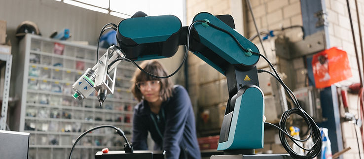 Robot arm in a workshop